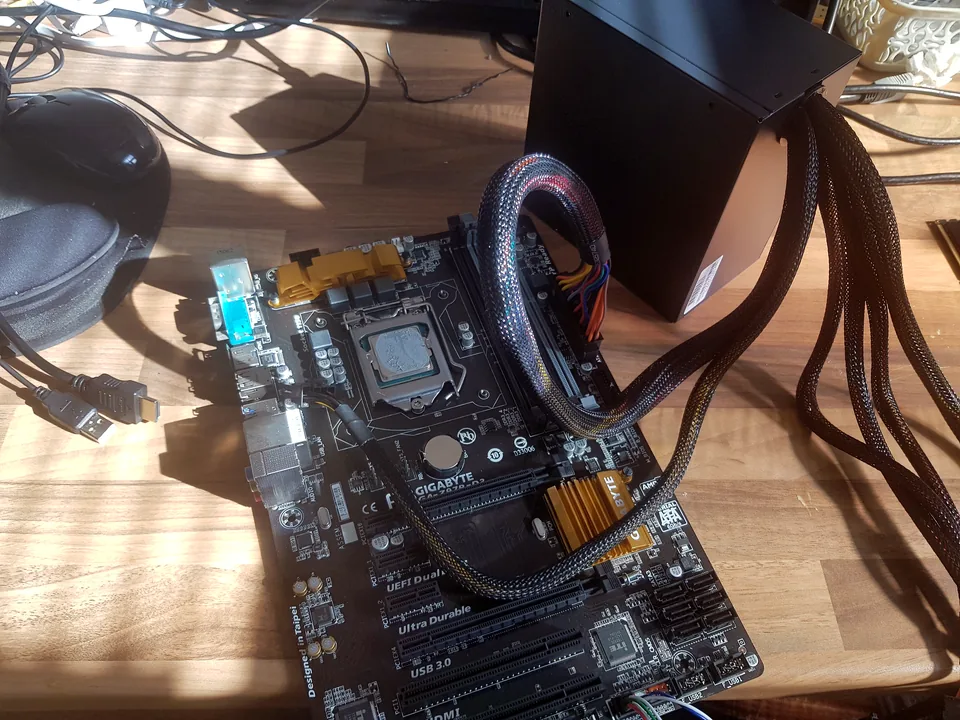 Desktop motherboard connected for computer fault diagnosis in Birmingham
