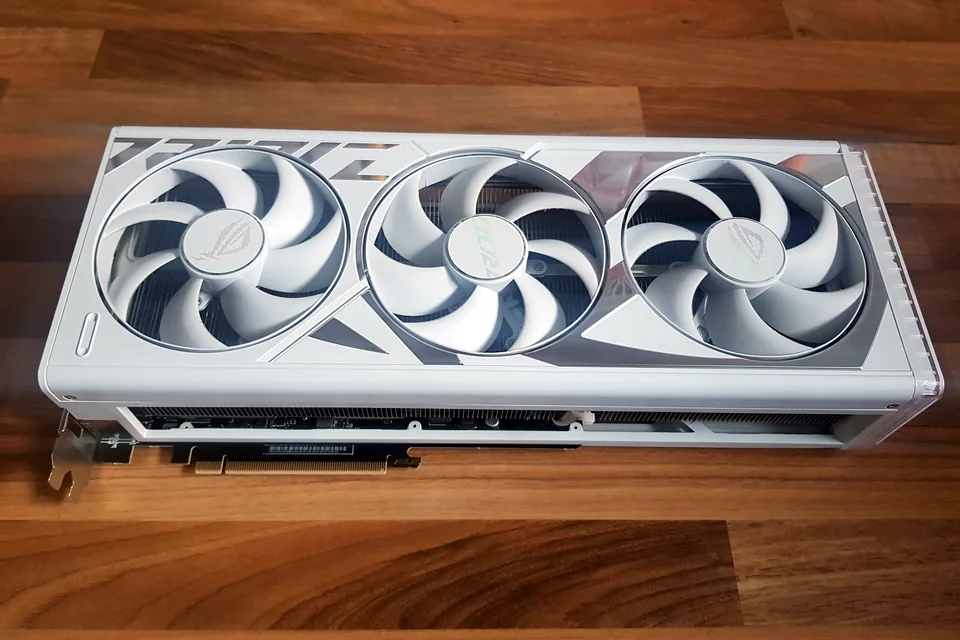 White graphics card photographed before installation and testing