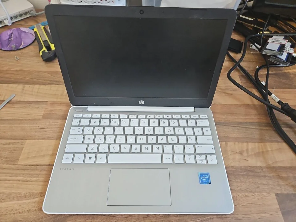 HP Stream laptop on a workshop bench before battery diagnosis in Birmingham
