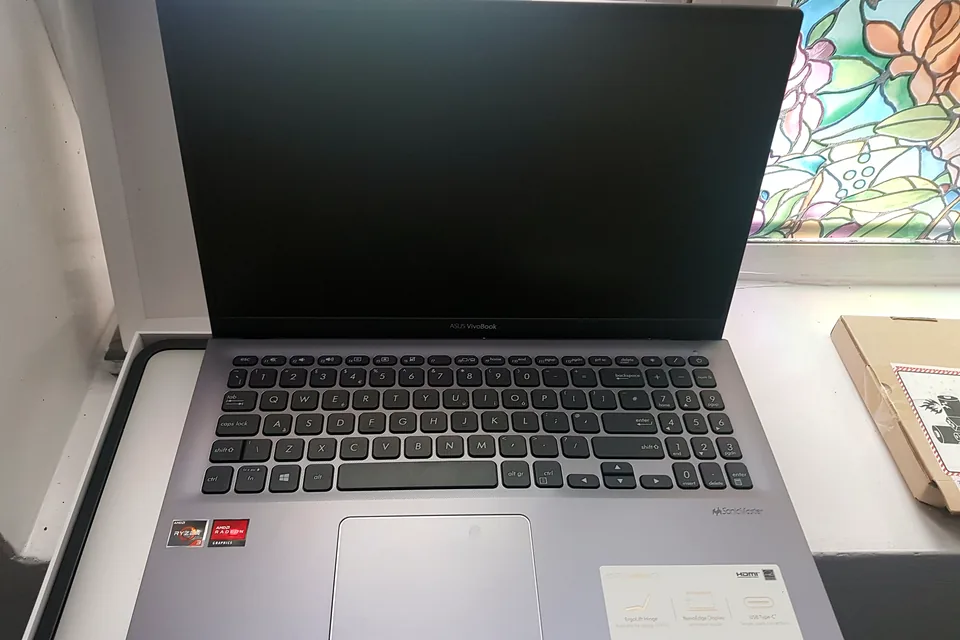 Laptop screen being inspected for a display replacement in Birmingham